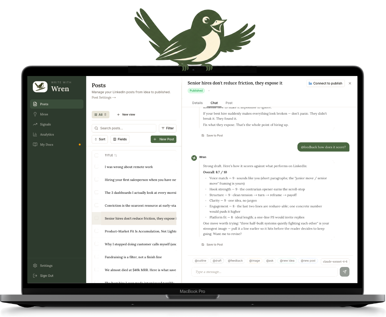The Wren app open on a laptop, with the wren bird perched on top, mid-song